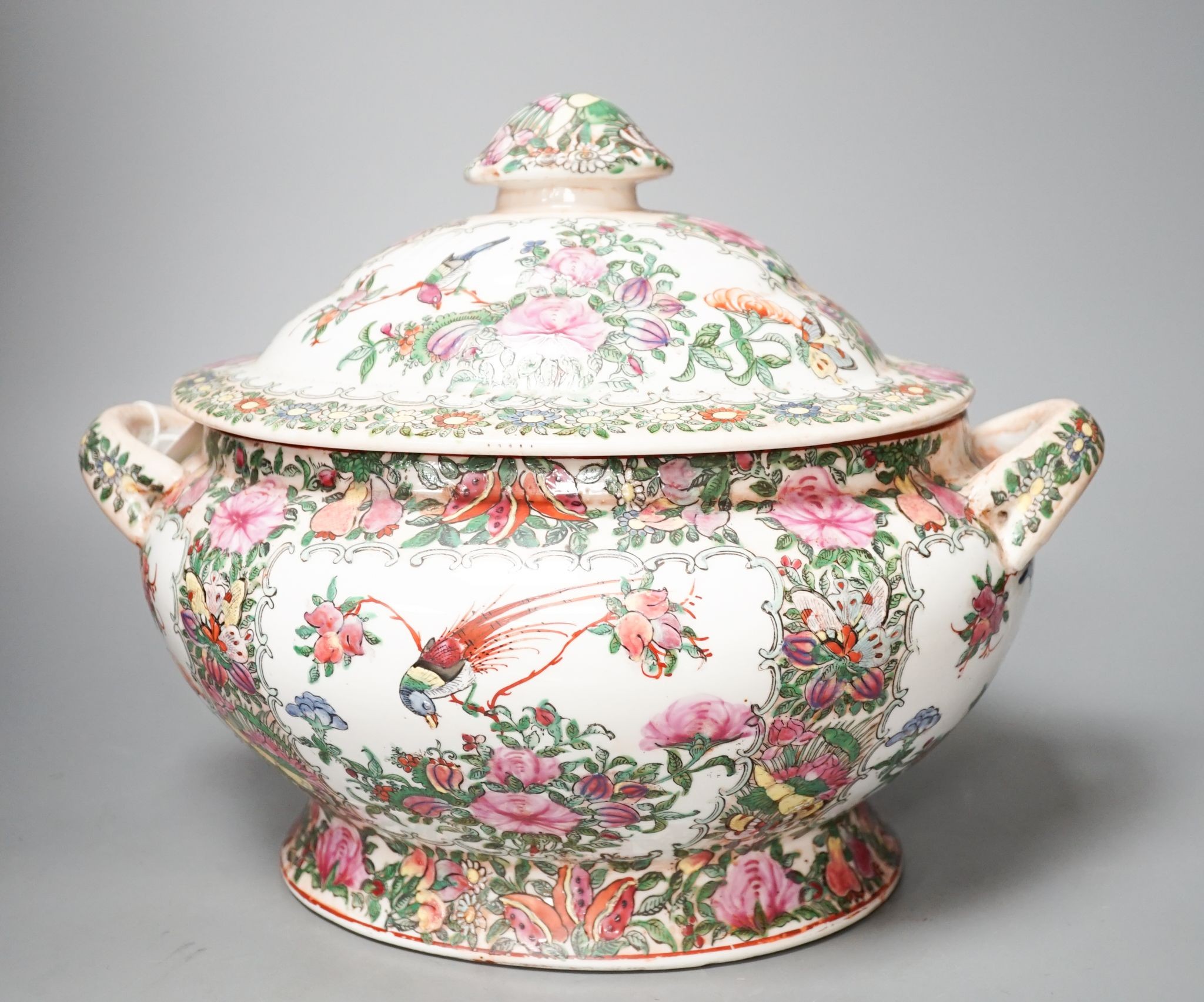 A large Chinese famille rose vase and a similar tureen and cover, vase 63 cms high.